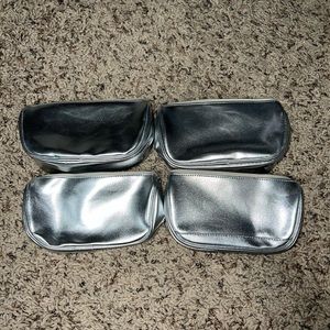 4 brand new La Prairie silver makeup bags